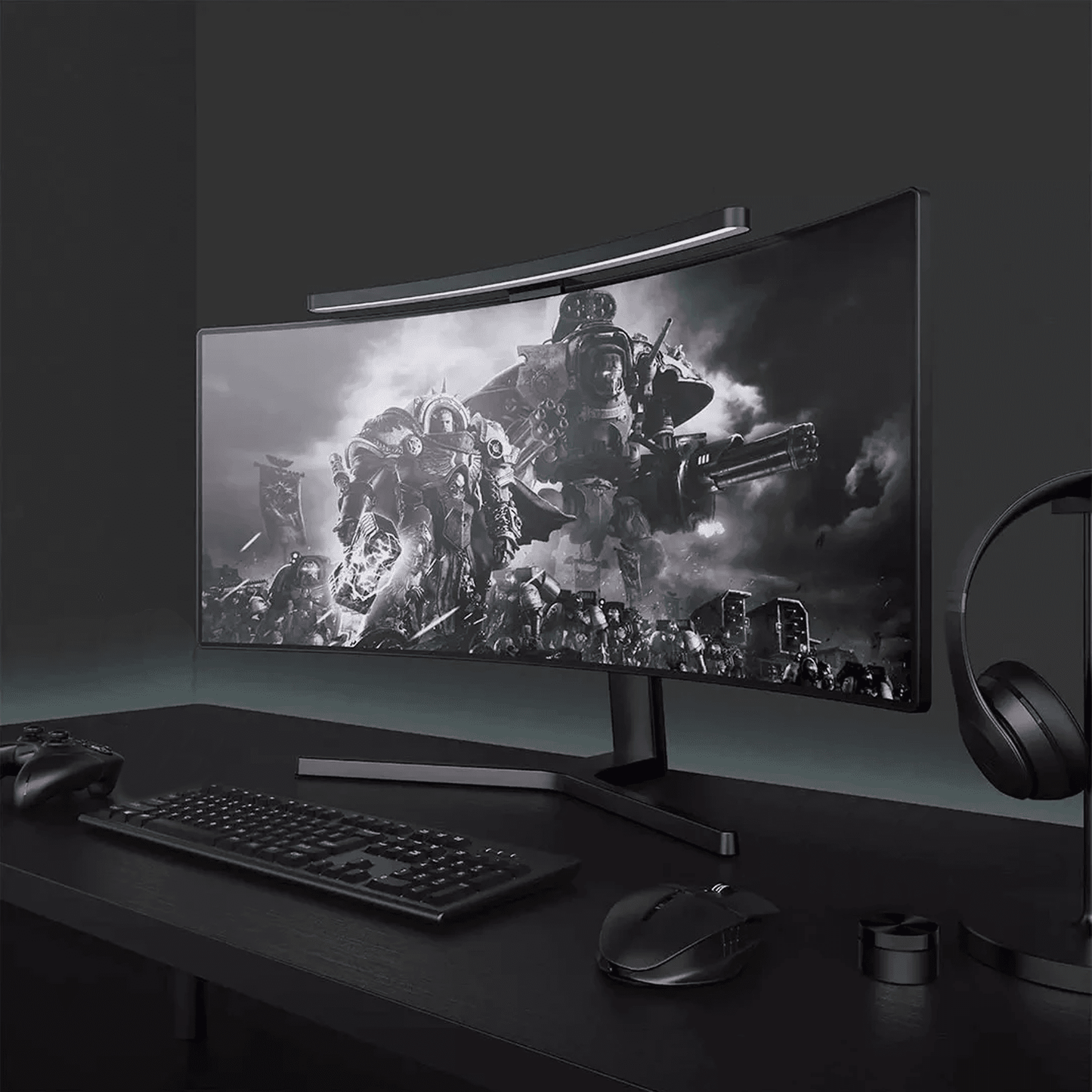 Mock image of our LYMAX Curved Light Bar on top of a curved display in an all black and grey environment. The best curved light bar for any home office and gaming setup.